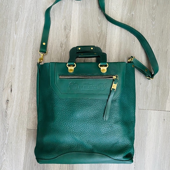 J.W. Hulme’s green leather bag